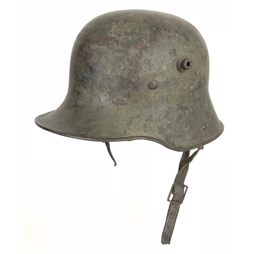 482 - Imperial German WW1 Steel Helmet.  A good and scarce example with original green painted finish to t... 