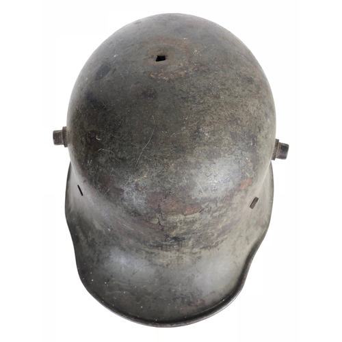 482 - Imperial German WW1 Steel Helmet.  A good and scarce example with original green painted finish to t... 