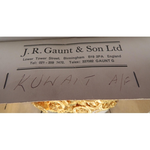 108 - J R Gaunt & Son Ltd Boxed Quantity Of Kuwait Cap Badges
gilt Kuwait cap badges.  Pin fixing... 