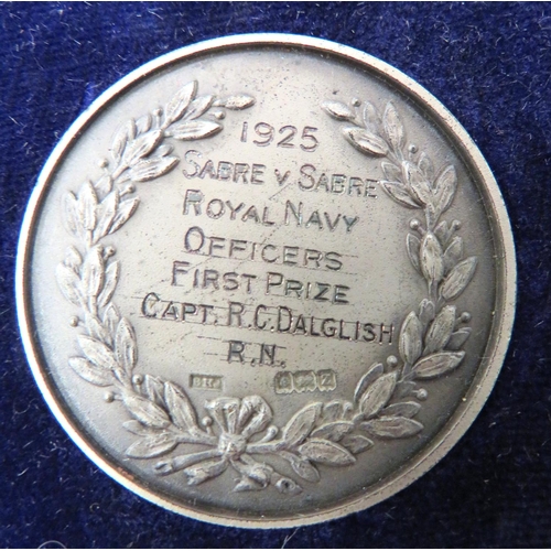 132 - Eight Royal Tournament Medallions
all named to Capt R C Dalglish RN.  Consisting three silver e... 