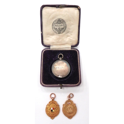 133 - Two Gold And Enamel Royal Naval Football Association Medals
consisting gold B'ham hallmarked, HMS Ma... 