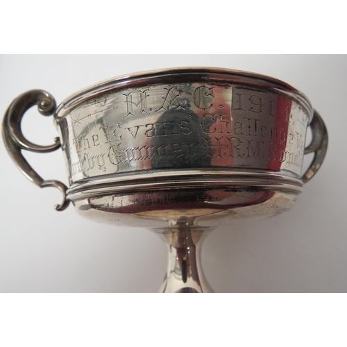 148 - Silver H.A.C. Presentation Cup And Sports Cap
consisting 4 inch high, wire top, double handled, silv... 