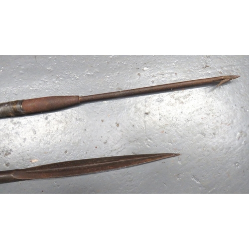 152 - Two 19th Century South Seas Spears
consisting double edged, leaf shape head example.  Wooden sh... 