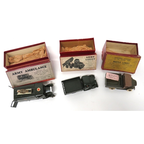 180 - Three W Britain Boxed Military Transport Vehicles
consisting boxed number 1512, Army ambulance, comp... 