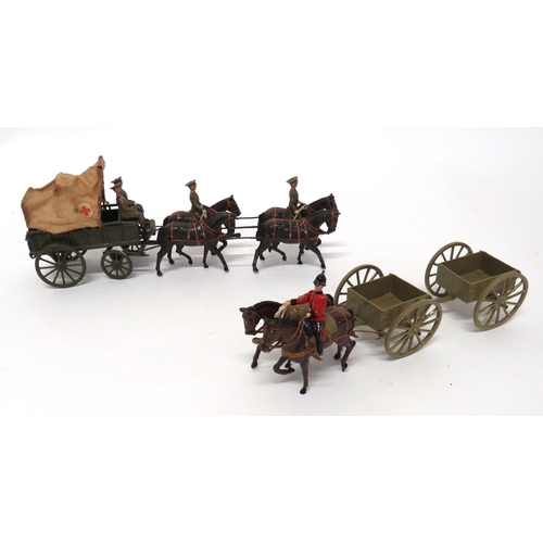 185 - Two Loose W Britain Wagon Sets
consisting RAMC field ambulance.  Four horses with riders in khaki se... 