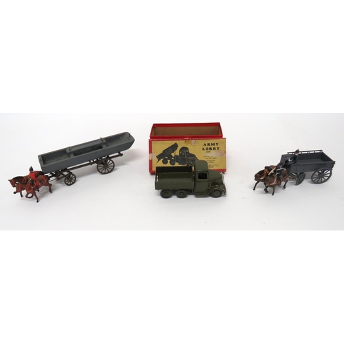 186 - Three W Britain Wagon Sets
consisting long limber with later made wooden barge.  Two horses with rid... 