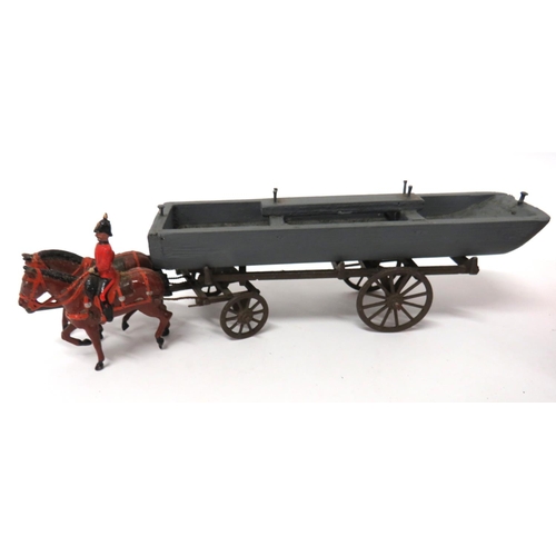 186 - Three W Britain Wagon Sets
consisting long limber with later made wooden barge.  Two horses with rid... 