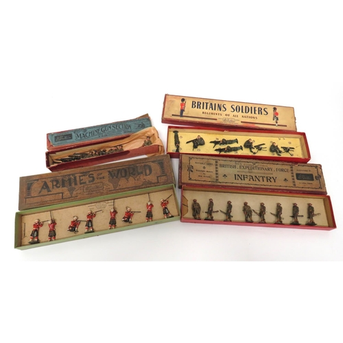 189 - Four W Britain Boxed Figure Sets
consisting set 198 machine gun section in seated position.  Khaki s... 