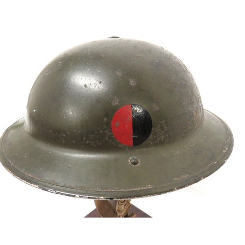 190 - WW2 Divisional Badged Home Guard MKII Steel Helmet
khaki green painted shell.  The front with w... 