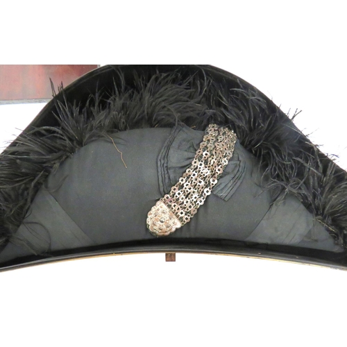 195 - Court Dress Bicorn Hat
black silk bicorn with feather edging.  The front with overlaid silk ros... 