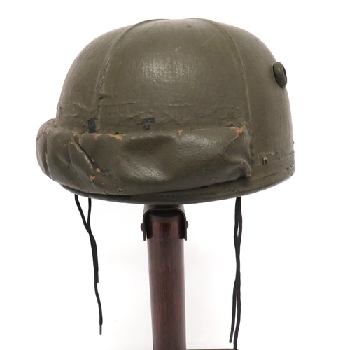 205 - Early War Pattern Armoured Troop Crash Helmet
green painted, six panel linen crown over a pulp inner... 