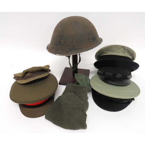 208 - Selection Of Various Hats
consisting post war MKIII steel helmet ... Dark blue dress cap with black ... 