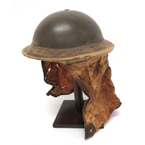 211 - Early WW2 Civil Defence Helmet And Anti Gas Neck Flap
grey green painted, MKII crown.  Black tr... 