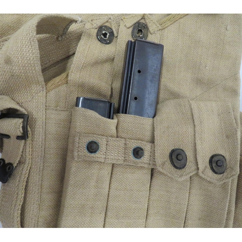 220 - Post War Thompson Sub Machine Gun Transit Bag
light khaki, canvas bag.  The top flap with pull ... 