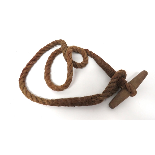 229 - WW2 Airborne/Commando Toggle Rope
heavy twisted rope.  One end with spliced loop.  The oth... 