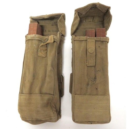 231 - Pair Of WW2 Sten SMG Ammunition Pouches
khaki canvas, rectangular pouches.  Top flap secured by... 