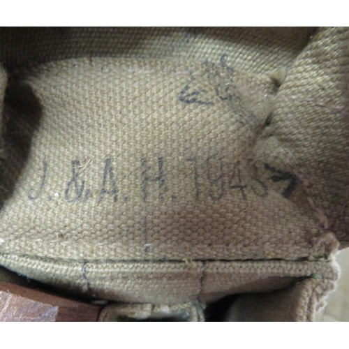 231 - Pair Of WW2 Sten SMG Ammunition Pouches
khaki canvas, rectangular pouches.  Top flap secured by... 