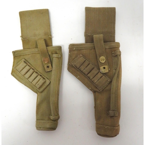 235 - Two Tank Crew Revolver Holsters
khaki canvas, open top holsters.  Front with cleaning rod tube ... 