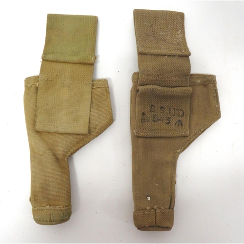 235 - Two Tank Crew Revolver Holsters
khaki canvas, open top holsters.  Front with cleaning rod tube ... 