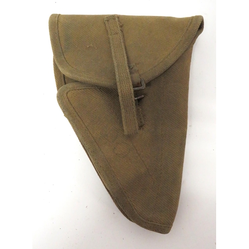 236 - Canadian Browning Hi-Power Auto Pistol Holster
khaki canvas body.  Top flap secured by loop and... 