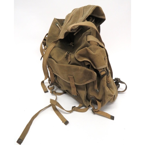 239 - WW2 Pattern Commando Rucksack
heavy green canvas rucksack.  Pockets to the front and sides, all... 