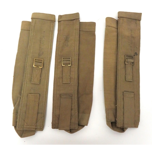 250 - Three WW2 Webbing Mortar Ammunition Transit Bags
khaki webbing, cylinder tubes.  The rear with ... 