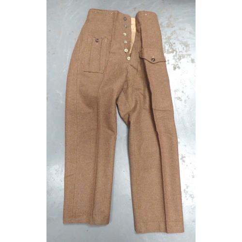 309 - WW2 1940 Pattern Battledress Trousers
khaki, woollen, wide leg trousers.  Right hip with first ... 