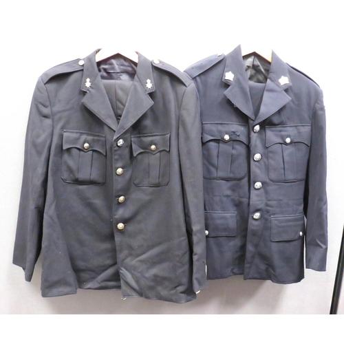 313 - Two Various Police Uniforms
consisting Malta Police.  Dark blue, open collar tunic.  Pleat... 