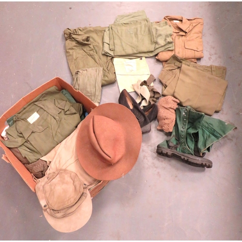 316 - Quantity Of Malaya Conflict 1960 Uniforms
including pair of canvas and rubber jungle boots.  Some pe... 