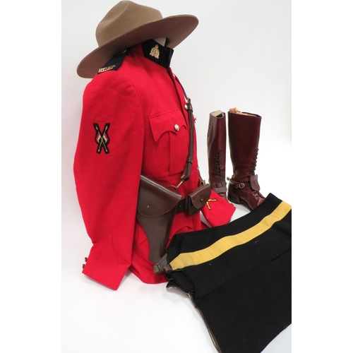 320 - Post 1953 Royal Canadian Mounted Police Uniform
scarlet, single breasted, high collar tunic.  C... 