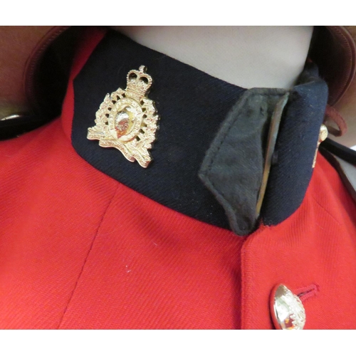 320 - Post 1953 Royal Canadian Mounted Police Uniform
scarlet, single breasted, high collar tunic.  C... 