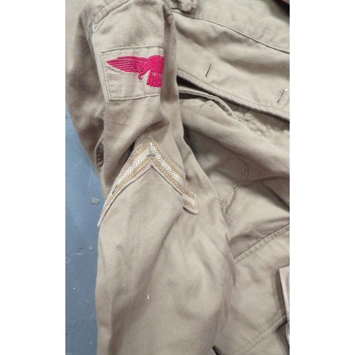 323 - 3 x Items Of Khaki Drill Uniform
consisting khaki drill breeches.  Slash waist pockets.  L... 