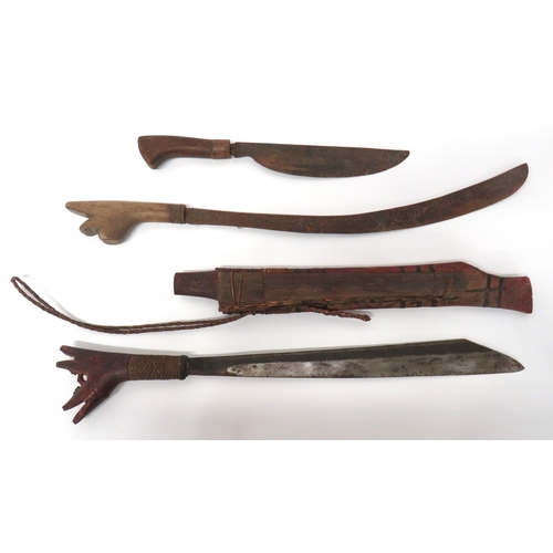 364 - Two Malayan/Borneo Parang Short Sword
consisting 17 inch, single edged blade widening towards the po... 