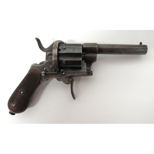 383 - Late 19th Century English Pinfire Revolver
7mm, 2 3/4 inch, blued barrel.  Brass, front stud si... 