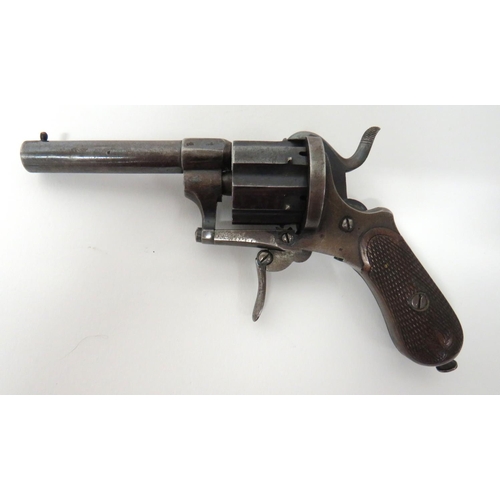 383 - Late 19th Century English Pinfire Revolver
7mm, 2 3/4 inch, blued barrel.  Brass, front stud si... 