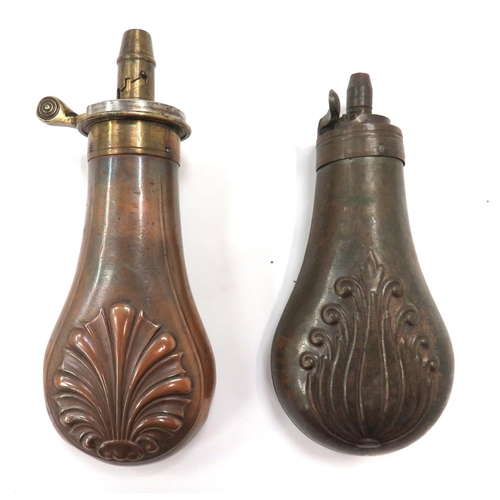 437 - Two 19th Century Powder Flasks
consisting 5 inch, copper bag body with floral shell decoration.  Bra... 