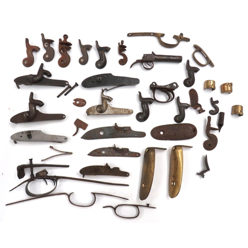 444 - Good Selection Of Military Percussion Gun Parts
including Enfield 1853/58 locks ... 1842 Tower lock ... 