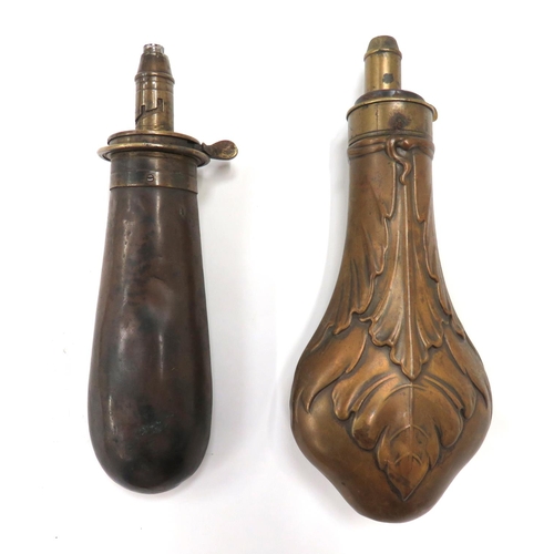 456 - Two Various 19th Century Powder Flasks
consisting darkened violin body with floral leaf decoration. ... 