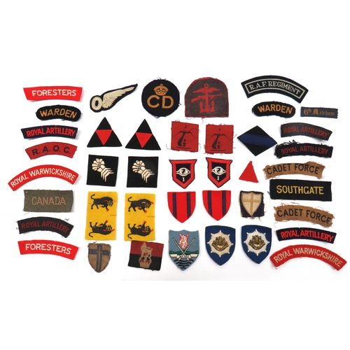 47 - 41 x Formation Badges And Shoulder Titles
Formation include printed Combined Operations tombstone sh... 