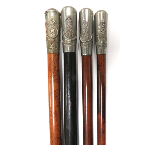 104 - Five Various Military Swagger Sticks
consisting white metal thimble top, KC Kings African Rifles ...... 