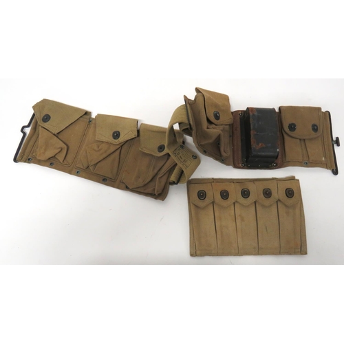 American WW1 Browning Automatic Rifle Magazine Belt
light khaki set of three magazine pouches.  The right side with single magazine pouch.  Steel butt holding plate and double Colt auto magazine pouch.  Rear dated 6-18.  Together with a Thomson SMG, light khaki webbing USMC pouch to hold five magazines.  Rear dated 1942.  2 items.