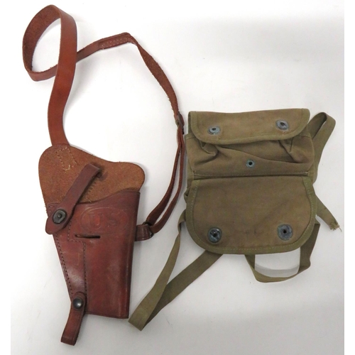 American Colt Auto Shoulder Holster
brown leather, open top holster. &nbsp;Front stamped US. &nbsp;Leather shoulder strap. &nbsp;Together with green webbing, double pouch for grenades. &nbsp;Rear belt hook and leg tie. &nbsp;2 items.