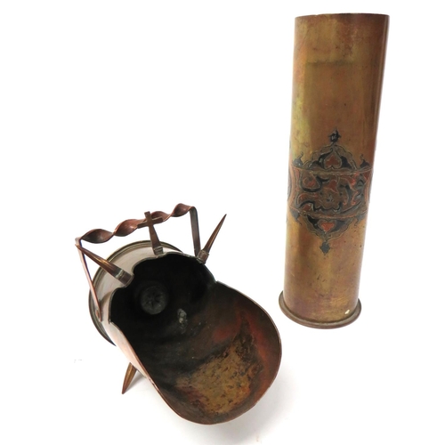 WW1 Turkish 1915 Trench Art Shell Case
brass case.  The body with silver and copper embossed and inlaid Turkish kufgari floral panels with date script.  Base of shell with maker "RHMF" dated 1915.  Together with a brass 18pr. shell case converted into a coal scuttle with bullet heads and top brass crucifix.  2 items.