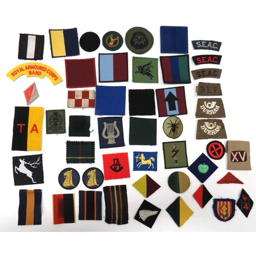 70 - Mixed Selection Of Shoulder Titles And Formation Badges
titles include embroidery BEF slip on ... Pa... 