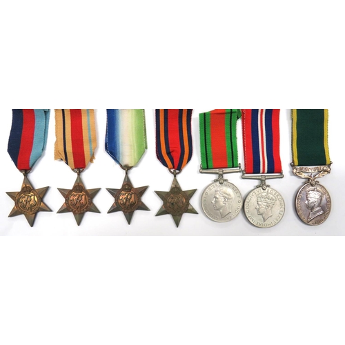 94 - Territorial Efficiency Medals And Various WW2 Medals
consisting King George VI example named 