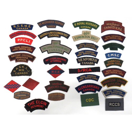 10 - 35 x Canadian Printed Shoulder Titles
including 48th Highlanders Of Canada ... 6 Royal Hussars Canad... 