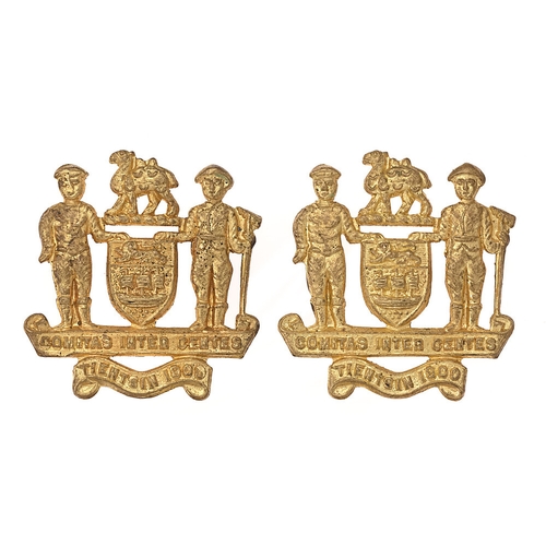 China. Tientsin Municipal Emergency Corps pair of collar badges c. 1900.  Good rare British made die-stamped brass Arms of Tientsin on scroll TIENTSIN 1900.    Loops.  VGC  Bob Betts Collection