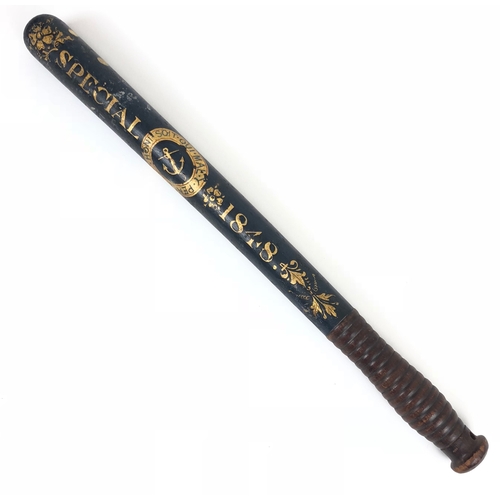1848 Special Constabulary Naval Themed Painted Truncheon. An unusual example of a Constables painted truncheon, the ground colour being dark blue decorated with a fouled anchor within a Garter Strap. With the text Special 1848. The grip of polished wood with ring turning. Length 18 inches. Overall GC with a few knocks to the wood. This may refer to a Special Constable of the Royal Dockyard in 1848. This year saw the Chartism riots this being one of the most active years of the Chartist movement who's aim was to influence political rights for the working class. The government enrolled special Constables and the army was put on the streets