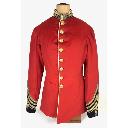 Victorian Unattached List Officer's Full Dress Tunic  A good and rare example, the scarlet tunic with blue facings and white piping as for line infantry. Pointed cuffs, with three rows of gold lace above and a crowsfoot in the lower angle. The left breast tailored for medals. Fine gilt buttons as per 1894 Dress Regulations, with Victorian crown and scalloped edge. The interior with a quilting lining. The overall condition is good, bullion bright, scarlet slightly dulled and age wear to the lining. No shoulder cords present.