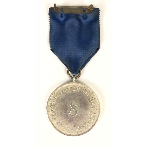 378 - German Third Reich Police 8 year Service Medal.  Good silvered example bearing wreath this eagle and... 